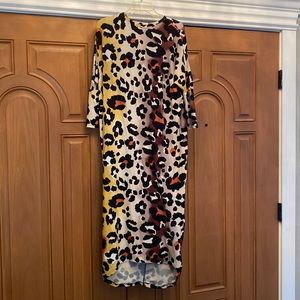 Bold leopard cocoon style high low dress sz M